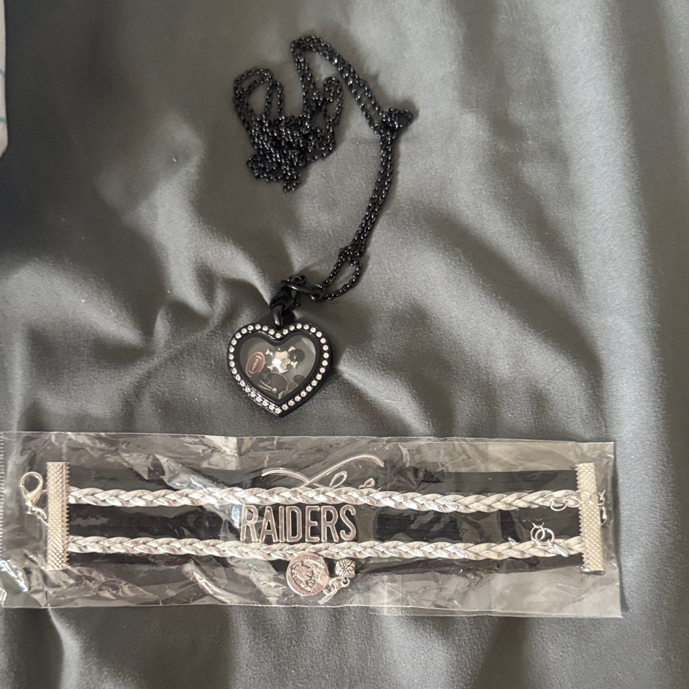 Black Heart Pendant Necklace and Silver Raiders Bracelet